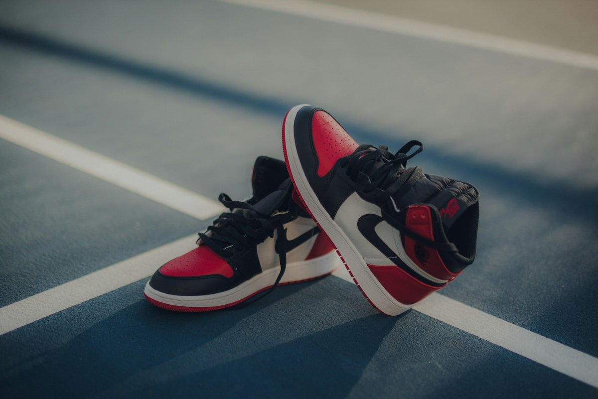 A pair of sneakers on a shelf, one of the hard-to-find items a concierge tracks down